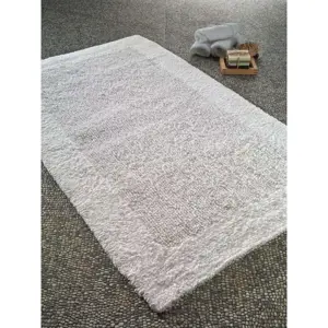 Produkt Bílá bavlněná předložka do koupelny Confetti Natura Heavy, 70 x 120 cm