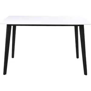 Produkt Bílý jídelní stůl s černou konstrukcí Bonami Essentials Vojens, 120 x 70 cm
