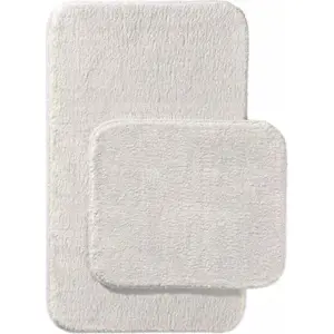 Produkt Krémové koupelnové předložky v sadě 2 ks 60x100 cm Plush – Mila Home
