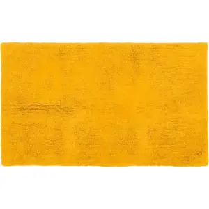 Okrově žlutá koupelnová předložka 100x60 cm Riva - Tiseco Home Studio