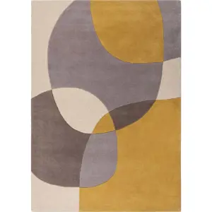 Okrově žlutý vlněný koberec 170x120 cm Glow - Flair Rugs